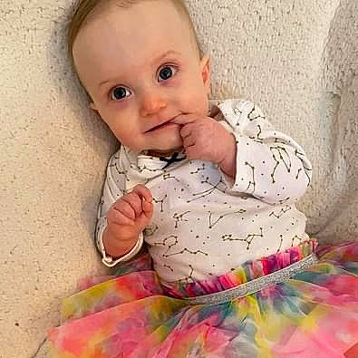 Stormy joined the competition — help win amazing prizes! baby, baby_toddler_clothing, beauty, cheek, comfort, dress, eye, face, hand, happy, head, human_body, iris, lip, nose, person, pink, skin, sleeve, textile