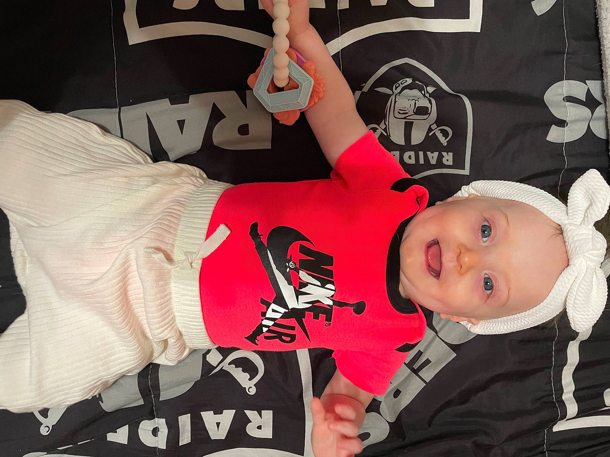 Stormy is registered to the contest to win money with this photo: baby, baby_toddler_clothing, carmine, cool, elbow, event, font, fun, gesture, graphics, hat, logo, pattern, person, sleeve, smile, t_shirt, toddler