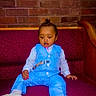 Amir joined the competition — help win amazing prizes! bench, blue_suit, brick_wall, child, curious, cute, fashion, footwear, formal_wear, indoors, maroon_upholstery, person, portrait, sitting, small_hands, striped_shirt, toddler, topknot, white_shoes, young_child