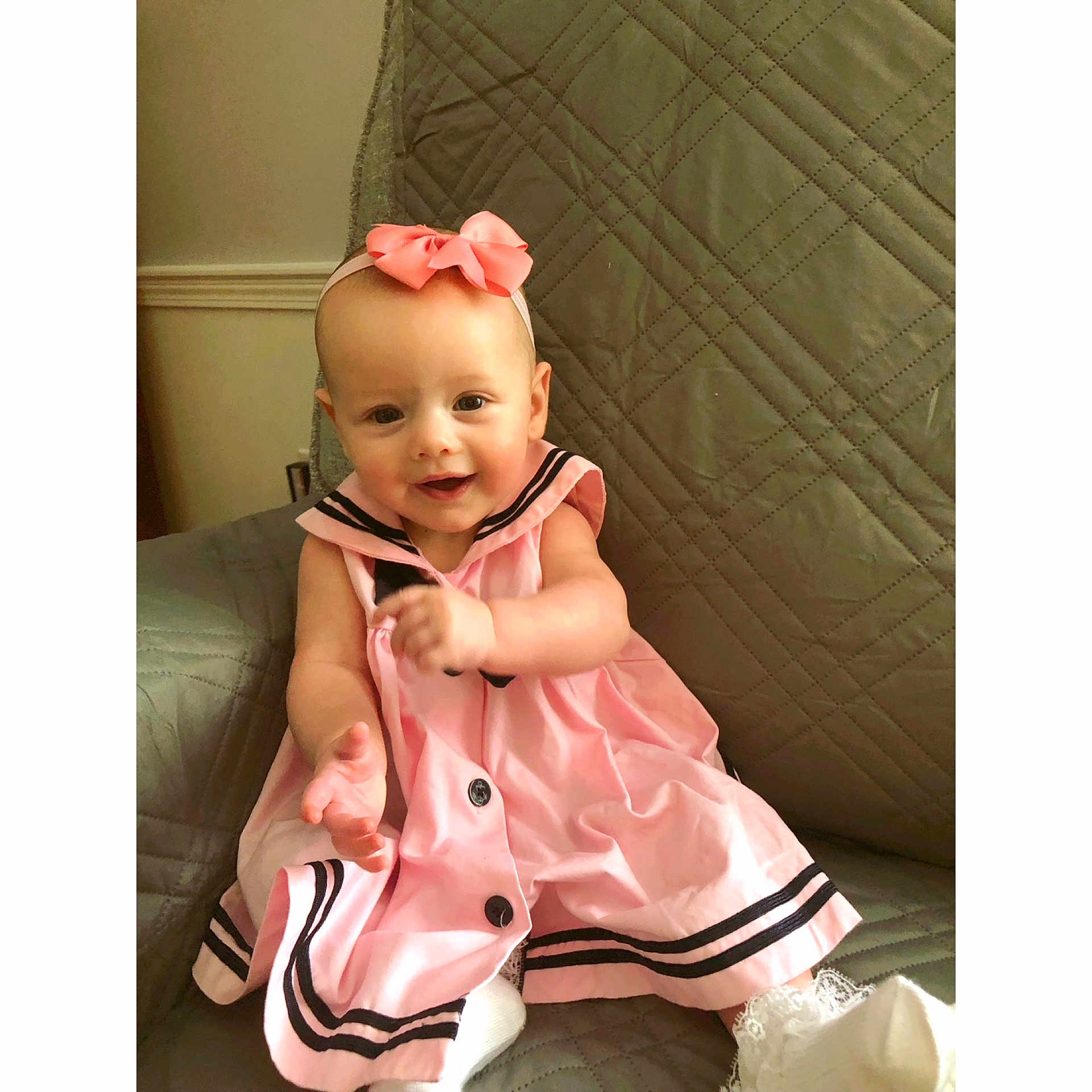 Mila joined the competition — help win amazing prizes! accessories, baby, bodypart, clothing, coat, costume, couch, cushion, dress, face, finger, furniture, hat, head, homedecor, newborn, person, photography, portrait, sitting