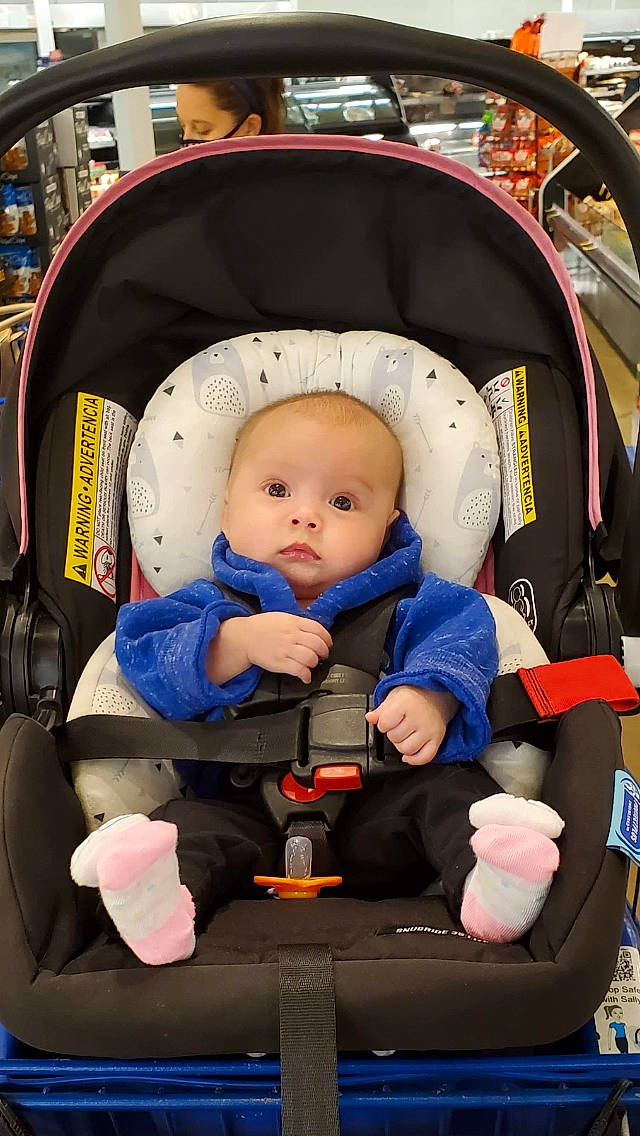 Emberlynn is registered to the contest to win money with this photo: baby, baby_carriage, baby_in_car_seat, baby_products, car_seat, car_seat_cover, child, person, product, toddler