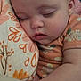 baby, sleeping, blanket, infant, face, arm, cozy, pattern, floral, soft, cute, child, peaceful, rest, closeup, indoors, comfort, skin, pillow, relaxation