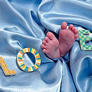 Kai is registered to the contest to win money with this photo: blue, child, computer_wallpaper, ear, finger, hand, product