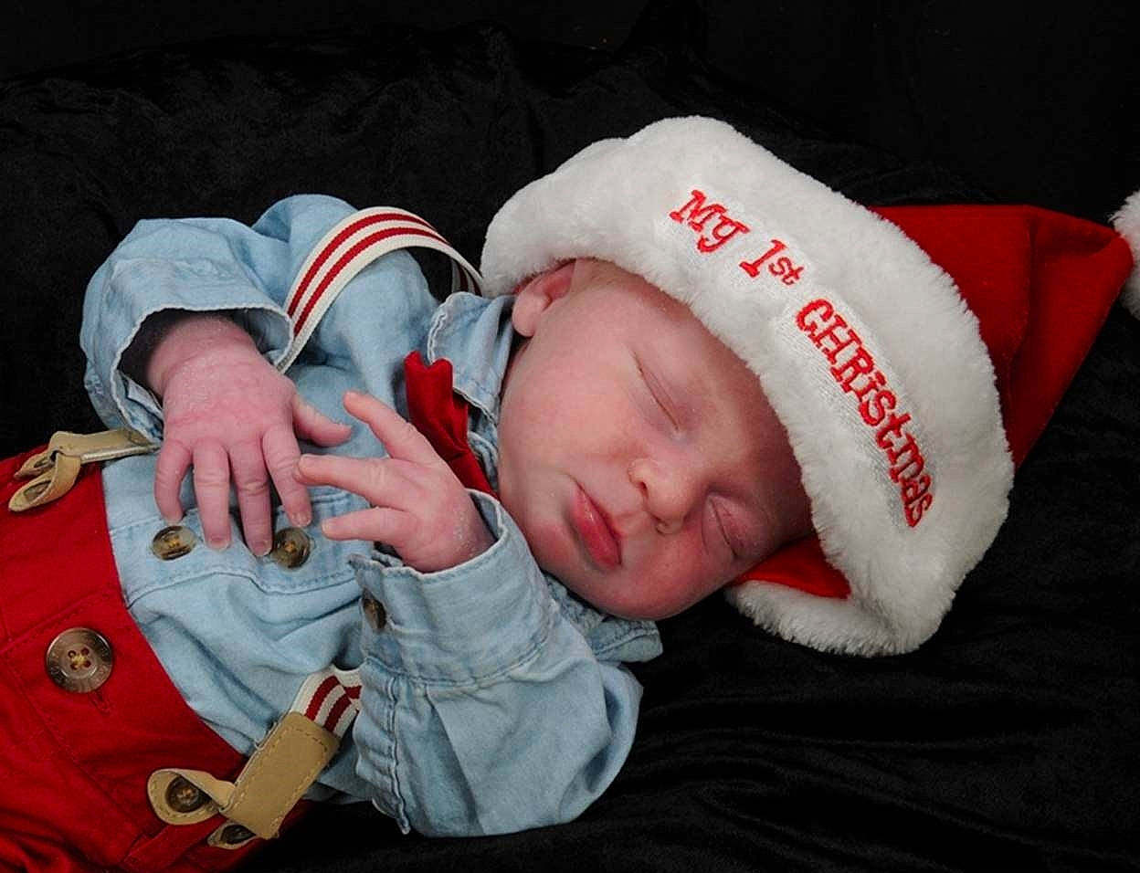 Kai joined the competition — help win amazing prizes! boy, child, headwear, infant, lap, person, product, red, sleep, smile, toddler