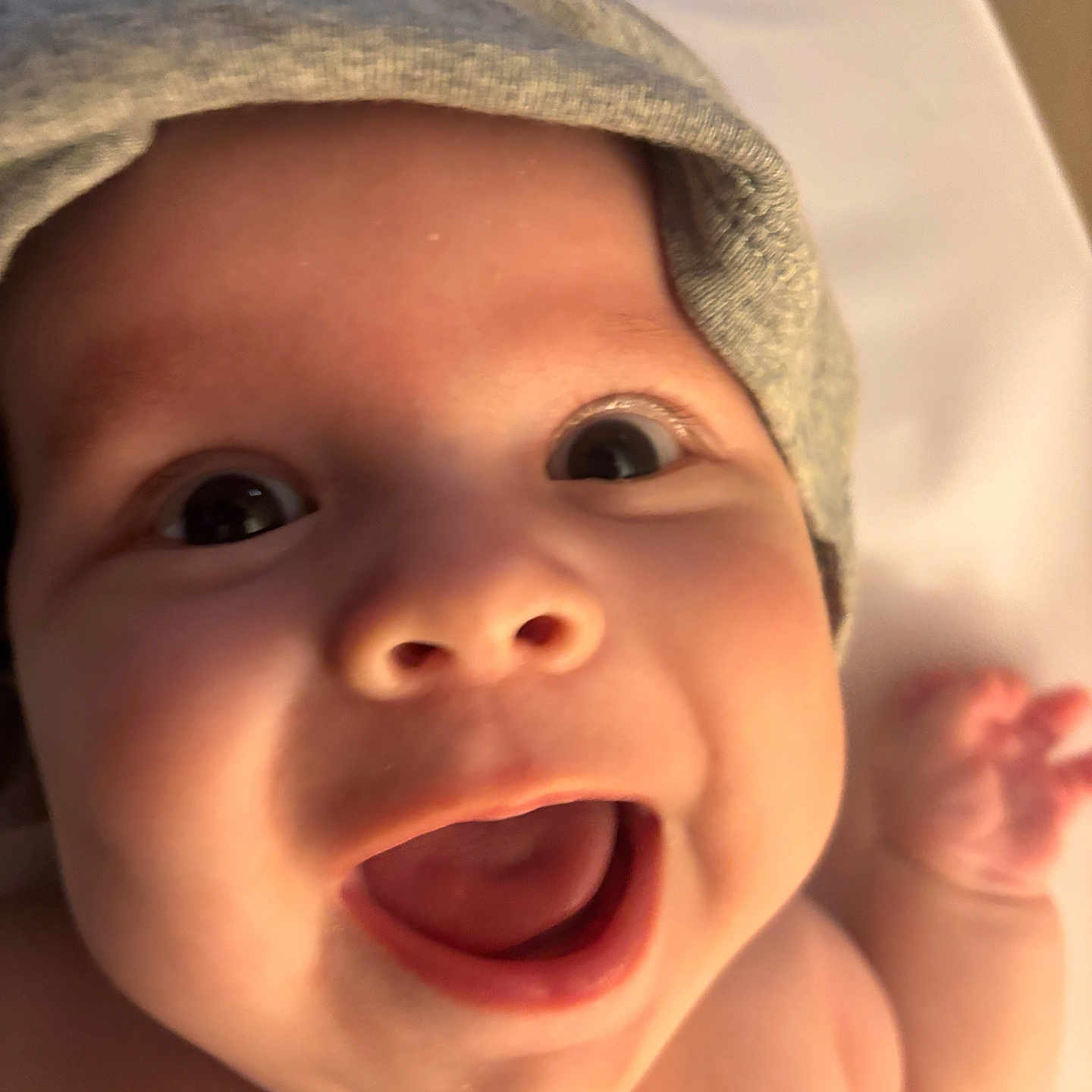 Charlie Anderson joined the competition — help win amazing prizes! baby, cheerful, child, closeup, cute, expression, face, hand, happy, hat, headwear, indoors, infant, joy, mouth, newborn, person, skin, smile, wide_eyes