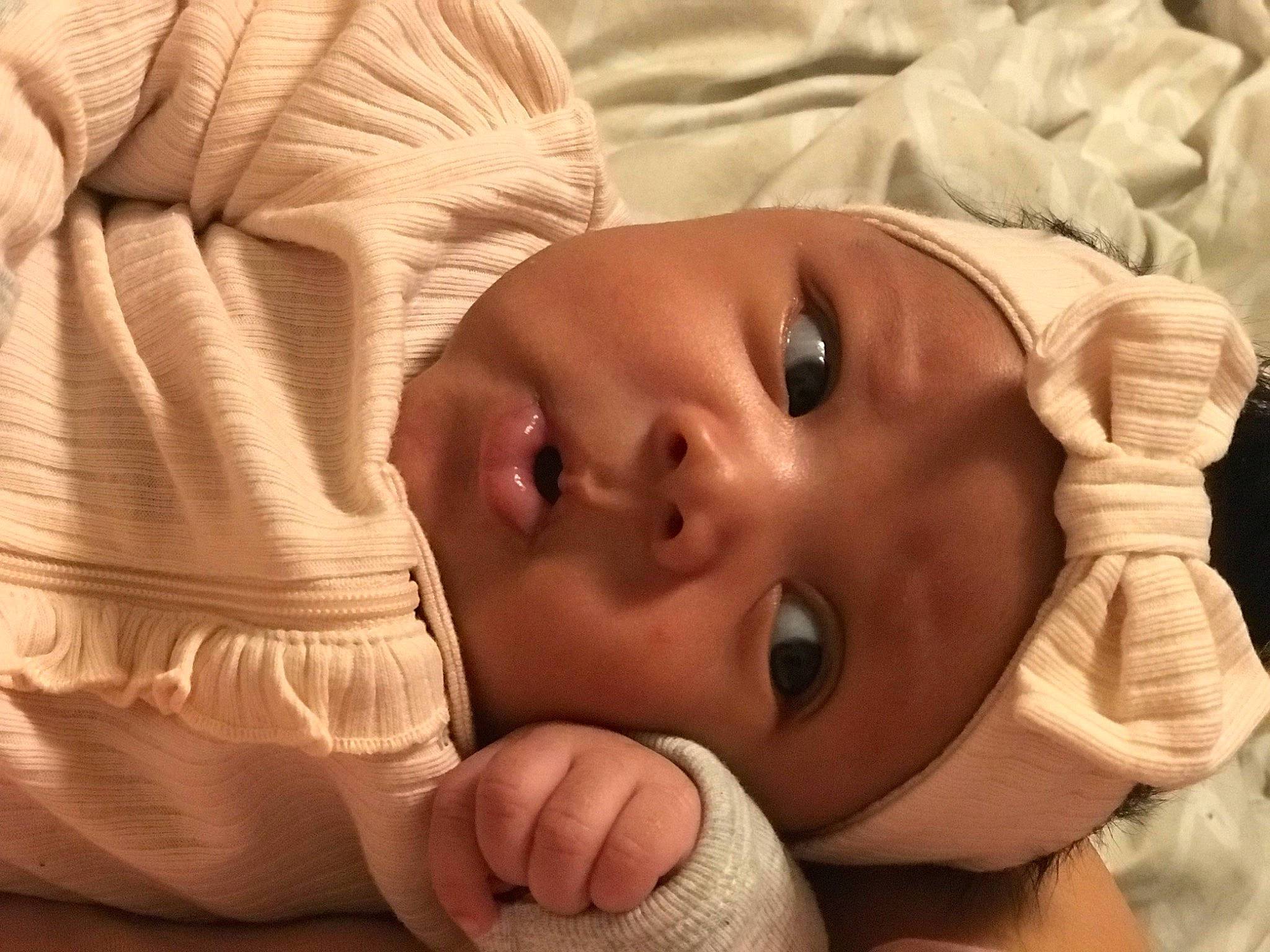 Lilian is registered to the contest to win money with this photo: arm, baby, cheek, comfort, ear, eye, eyebrow, eyelash, face, forehead, hair, hand, head, human_body, lip, mouth, neck, nose, person, skin