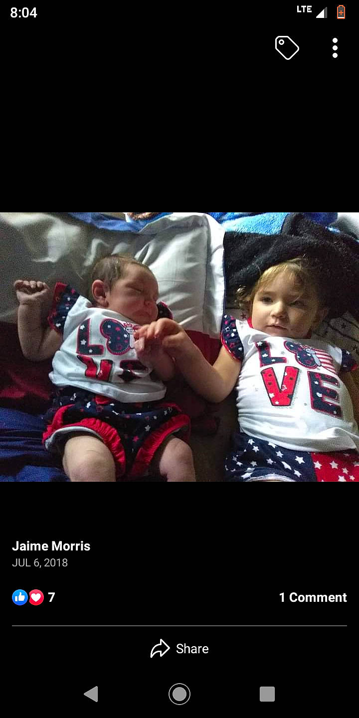 Savannah is registered to the contest to win money with this photo: advertising, baby, baby_products, baby_toddler_clothing, child, darkness, event, fictional_character, flash_photography, font, fun, happy, magenta, movie, pattern, person, photo_caption, sitting, sleeve, t_shirt