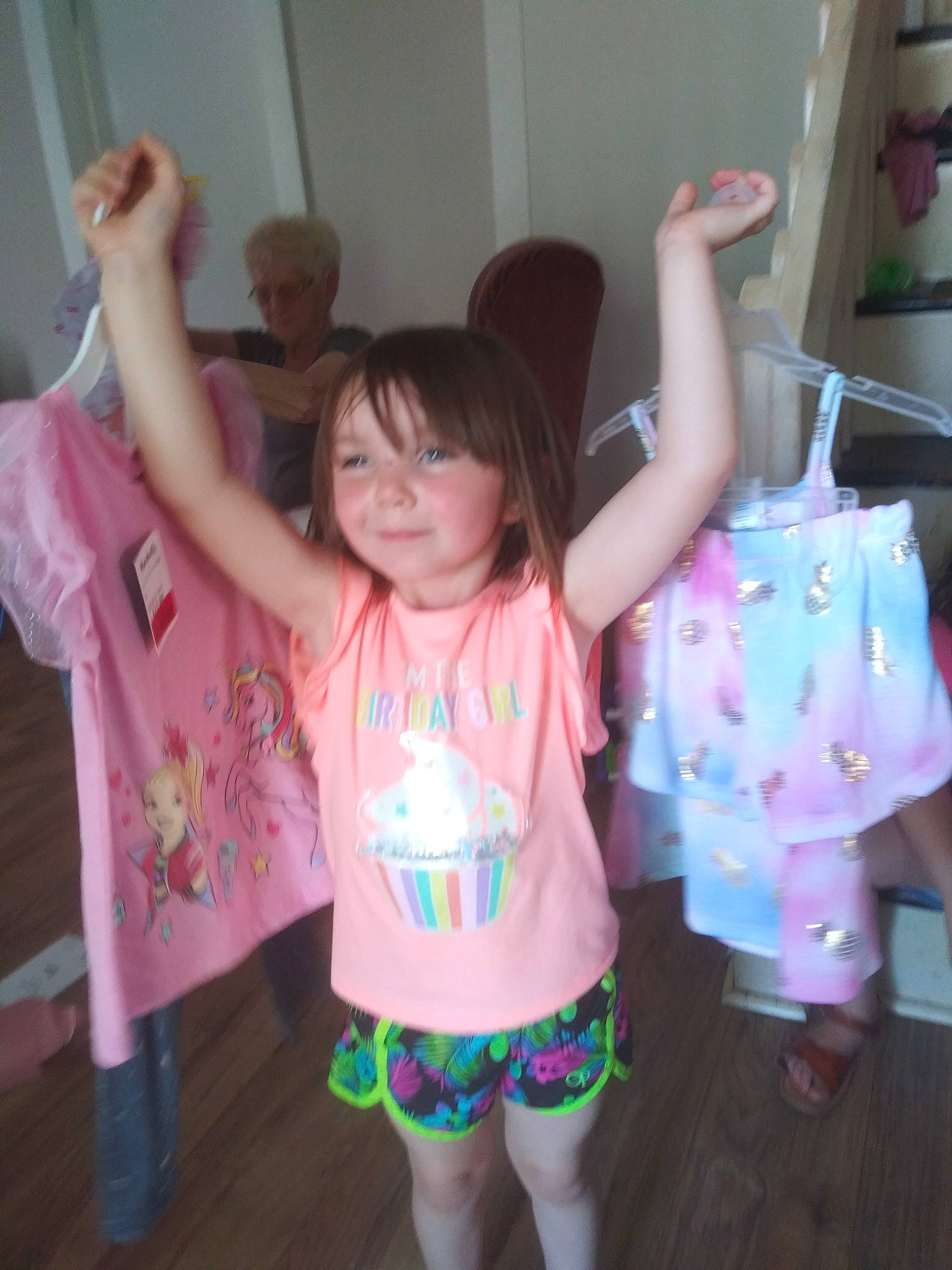 Annabel joined the competition — help win amazing prizes! baby_toddler_clothing, eye, facial_expression, finger, gesture, hairstyle, happy, human_body, joint, joy, mouth, person, pink, product, purple, shoulder, skin, sleeve, smile, standing