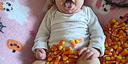 Aurelia is registered to the contest to win money with this photo: baby, black, blanket, candy_corn, celebration, costume, cute, decor, festive, ghost, halloween, headband, infant, lying_down, orange, pumpkin, shoes, soft_toy, white, yawning