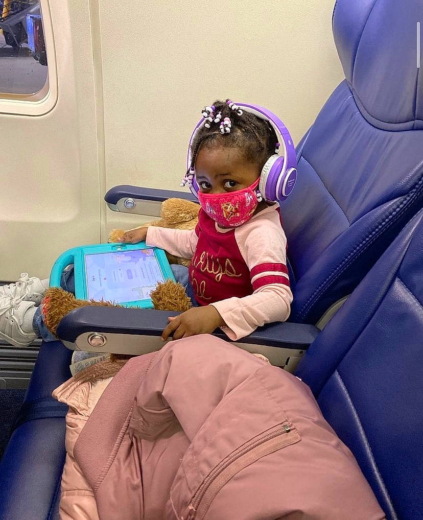 Makiah joined the competition — help win amazing prizes! car_seat, child, comfort, design, eyewear, fun, human_body, human_leg, lap, leg, leisure, magenta, passenger, person, product, room, sitting, sunglasses, thigh, toddler