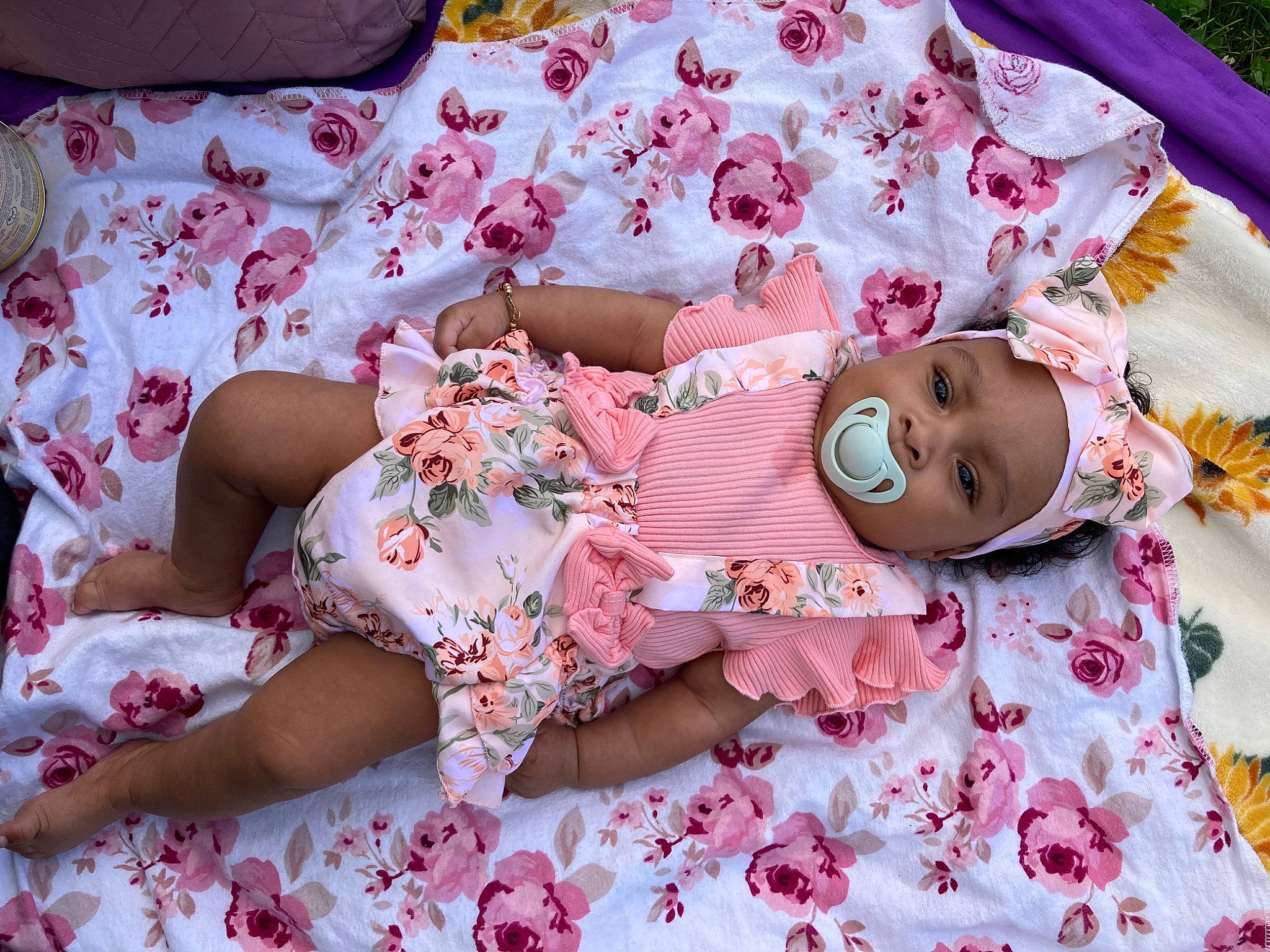 Sitana is registered to the contest to win money with this photo: baby_toddler_clothing, beauty, bed_sheet, bedding, child, comfort, design, flower, happy, headwear, linens, magenta, pattern, peach, person, petal, pink, skin, sleeve, smile