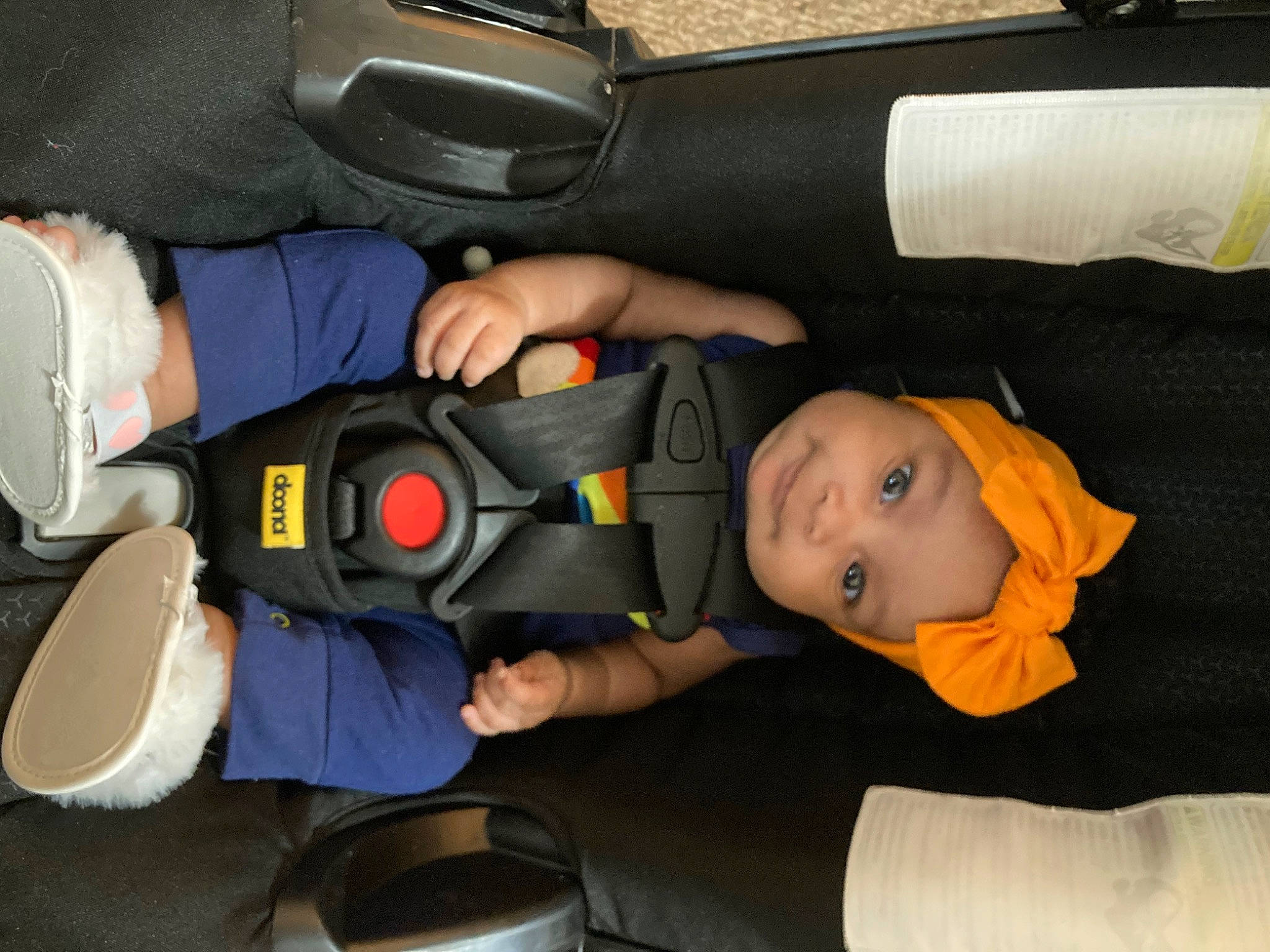 Sitana is registered to the contest to win money with this photo: auto_part, automotive_design, automotive_wheel_system, baby, baby_products, baby_toddler_clothing, car_seat, child, comfort, family_car, fun, gesture, headwear, joint, luxury_vehicle, motor_vehicle, person, product, seat_belt, thumb