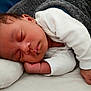 Kehwan participe au concours pour gagner de l'argent avec cette photo : baby, sleeping, blanket, pillow, infant, peaceful, cozy, resting, child, face, hand, white_clothing, soft, indoors, cute, newborn, portrait, relaxing, peace, toddler
