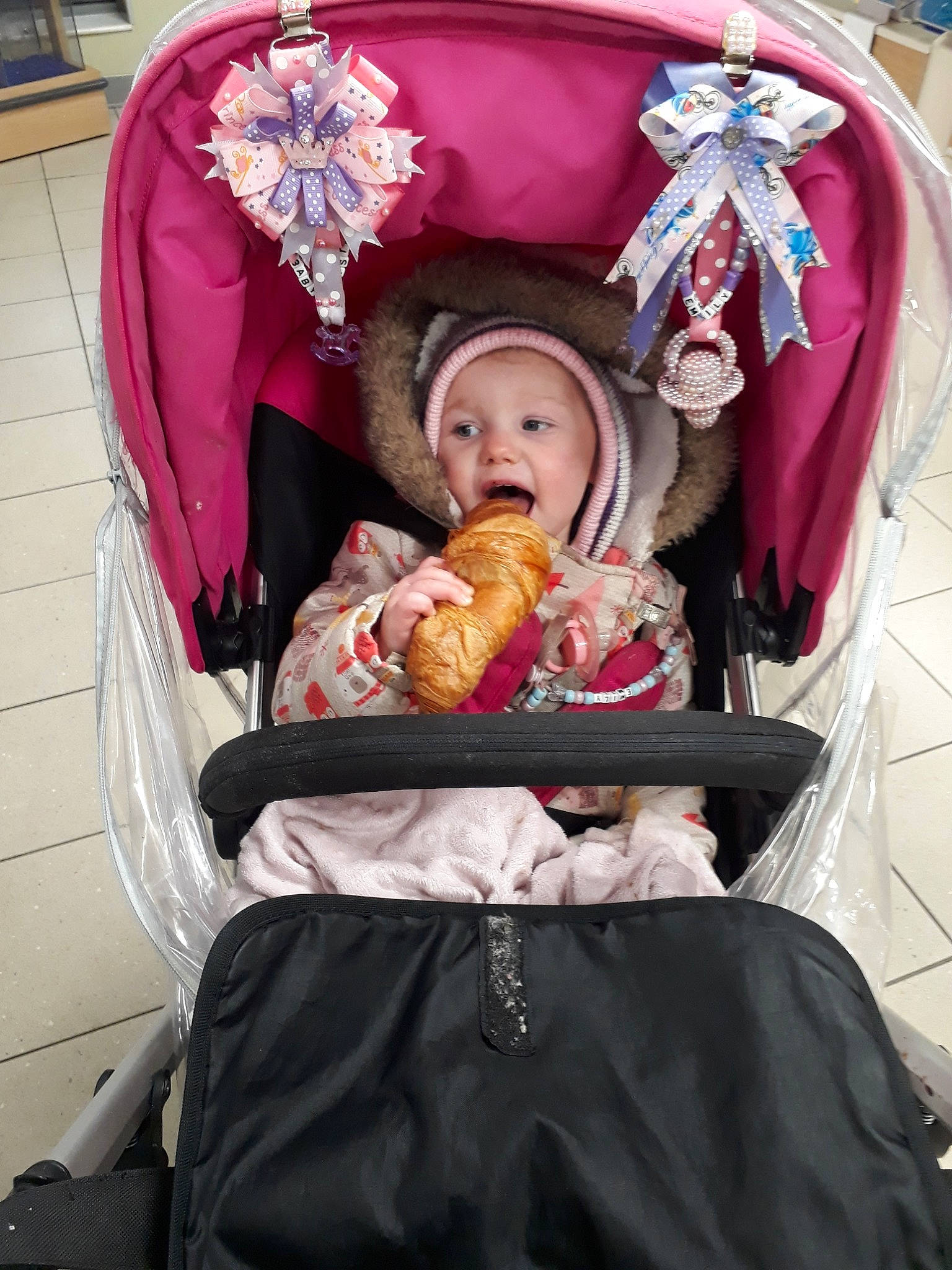 Emily is registered to the contest to win money with this photo: baby_carriage, baby_products, child, furniture, person, product, toddler