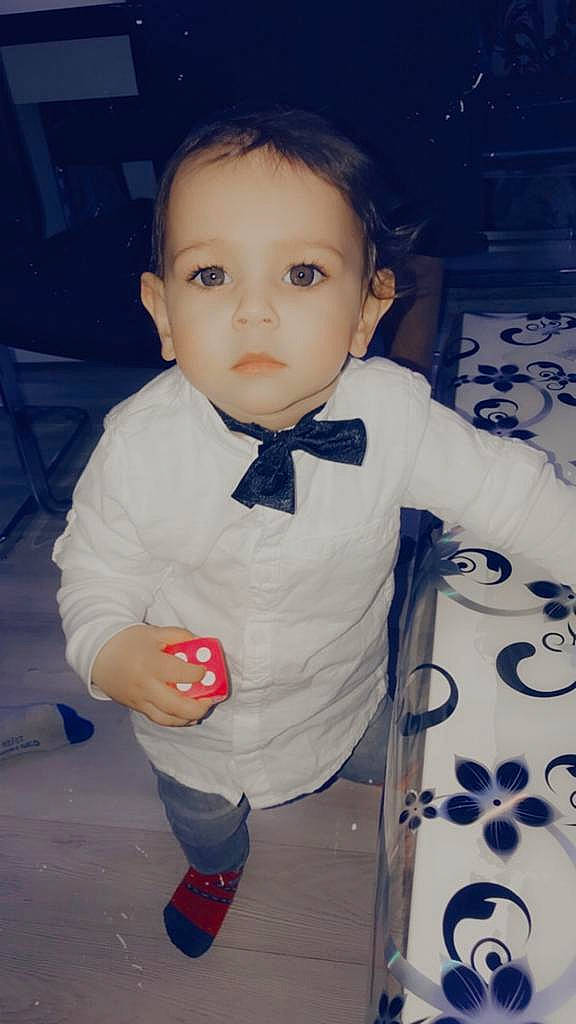 Issa participe au concours pour gagner de l'argent avec cette photo : baby, baby_products, baby_toddler_clothing, cheek, child, dress_shirt, electric_blue, formal_wear, fun, happy, nose, pattern, person, plaid, sitting, sleeve, sock, standing, tie, toddler