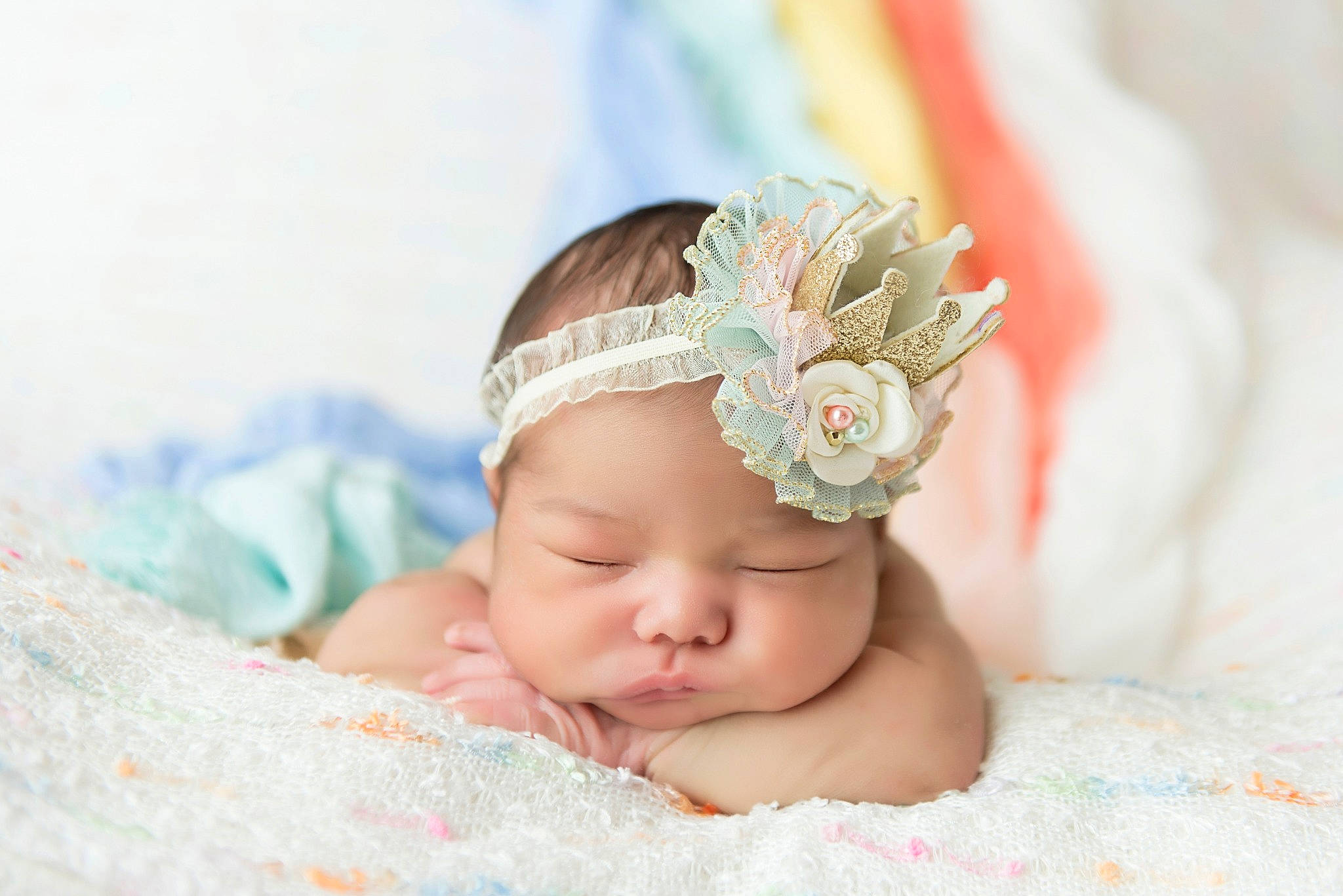 Noel is registered to the contest to win money with this photo: baby, baby_sleeping, child, crown, fashion_accessory, hair_accessory, headband, headgear, headpiece, jewellery, person, photograph, photography, pink, toddler, turquoise