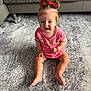 Michelle is registered to the contest to win money with this photo: toddler, child, sitting, carpet, red_bows, pink_dress, indoor, cute, funny_face, barefoot, hair_bows, leather_couch, home, young_child, expression, person, baby, floor, candid, portrait