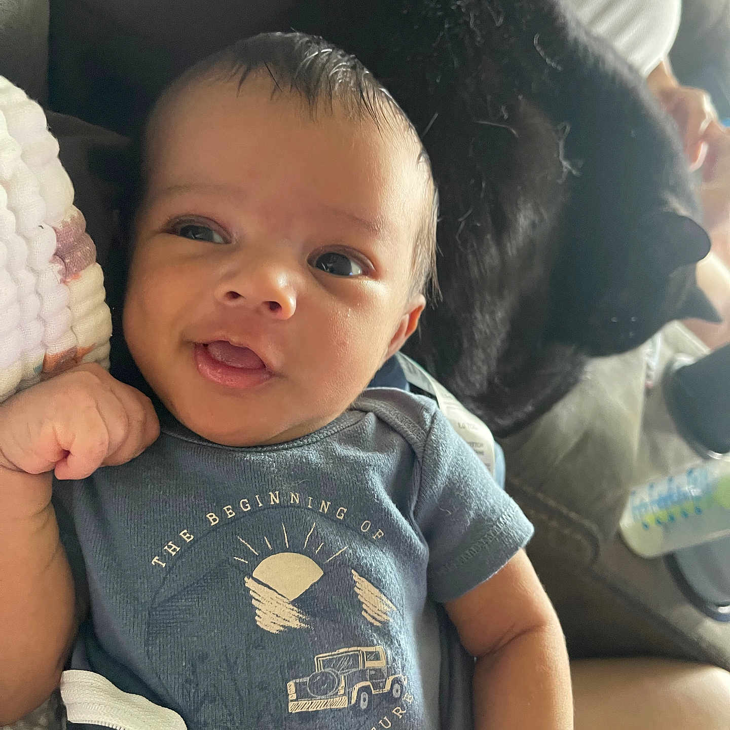 Jensen is registered to the contest to win money with this photo: animal, baby, black_cat, blue_shirt, cat, child, couch, cozy, cute, face, hand, happy, home, indoor, infant, person, pet, relaxing, smiling, text_on_clothing