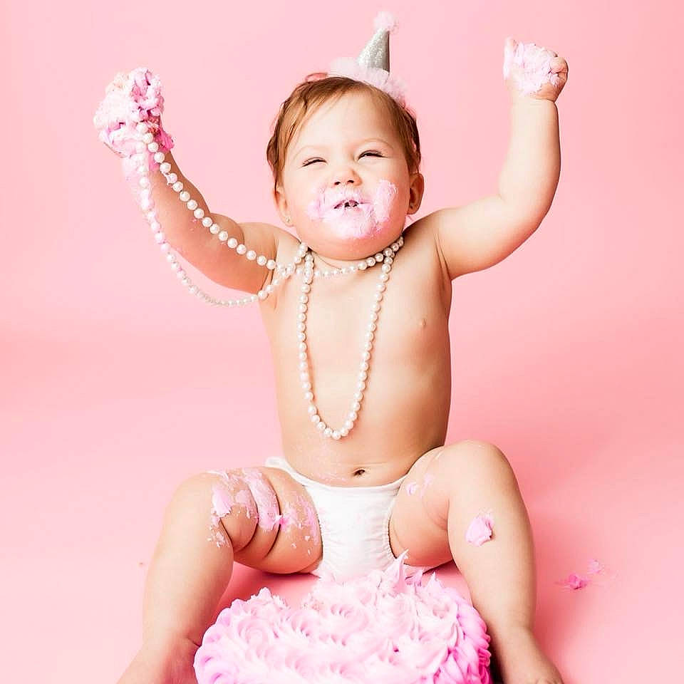 Caleighsi joined the competition — help win amazing prizes! baby, child, child_model, costume_accessory, facial_expression, fashion_accessory, finger, fun, hair_accessory, hand, happy, headgear, headpiece, person, pink, product, sitting, skin, smile, stomach