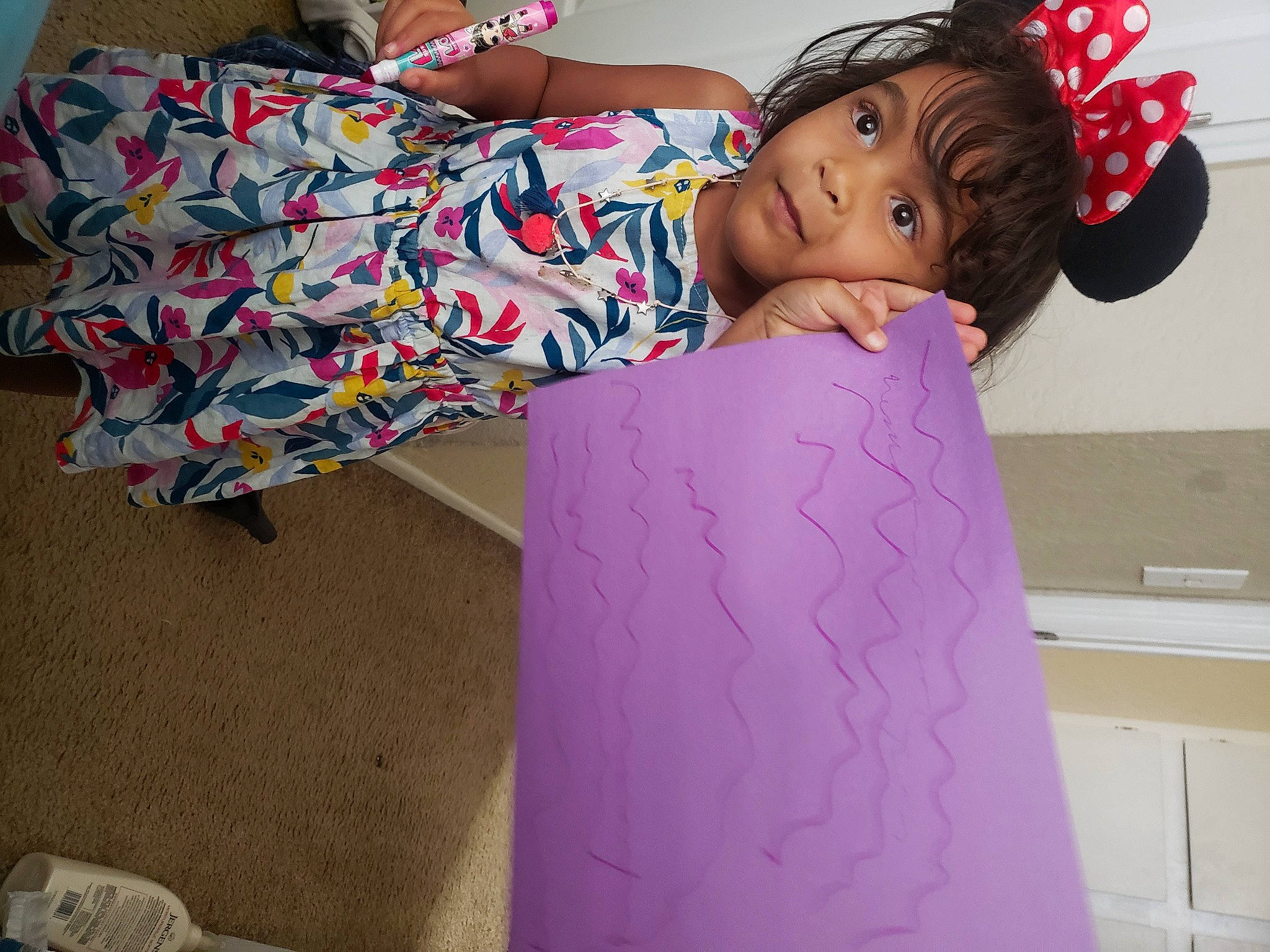 Keira joined the competition — help win amazing prizes! baby_toddler_clothing, child, fashion_design, fun, happy, hat, magenta, paper, paper_product, pattern, person, pink, purple, room, sandal, sitting, sleeve, textile, thigh, toddler