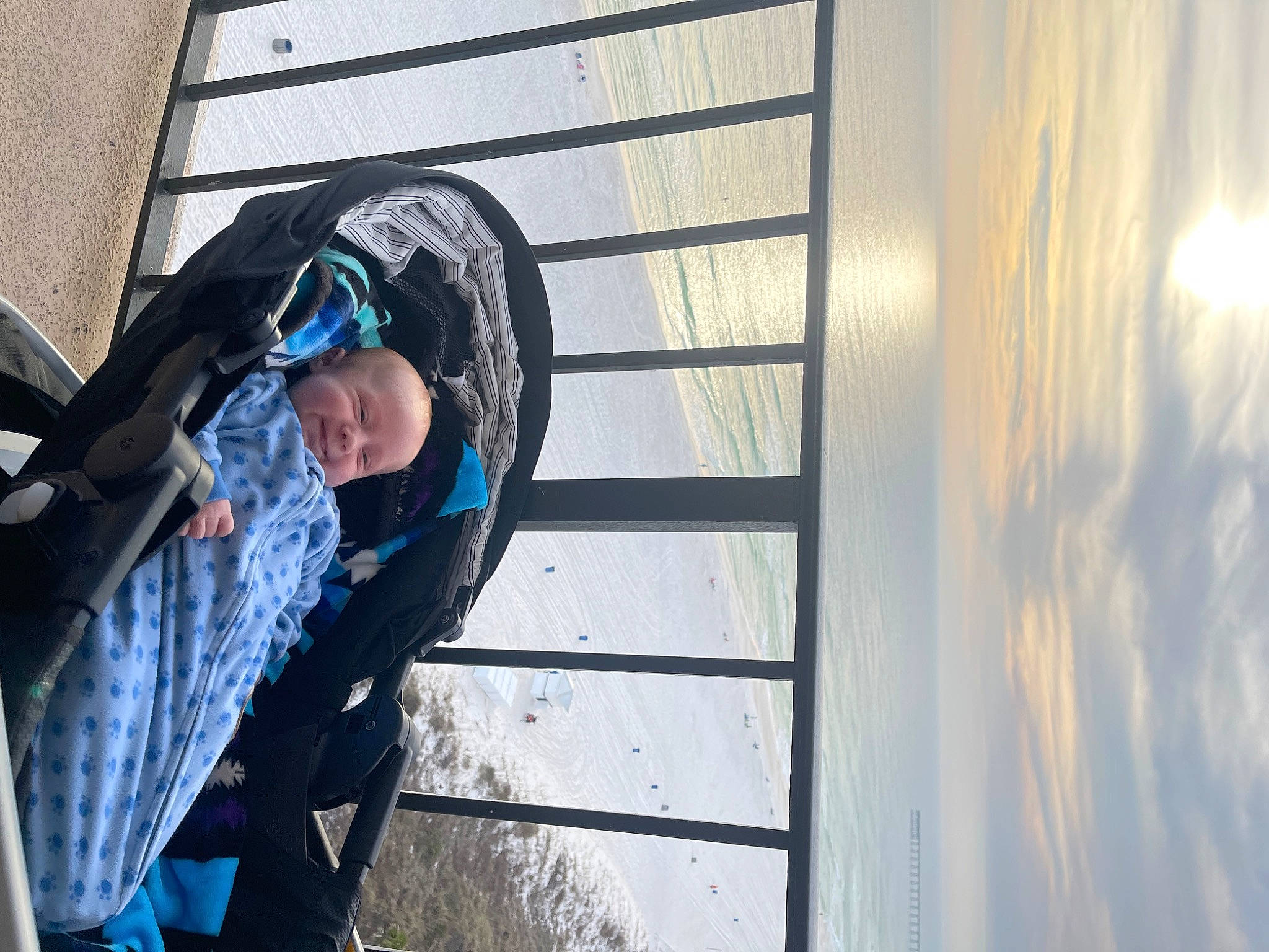 Emmerson is registered to the contest to win money with this photo: cloud, daytime, electric_blue, eyewear, facade, freezing, fun, glass, goggles, leisure, person, personal_protective_equipment, recreation, reflection, sky, sunglasses, tints_and_shades, tree, water, winter