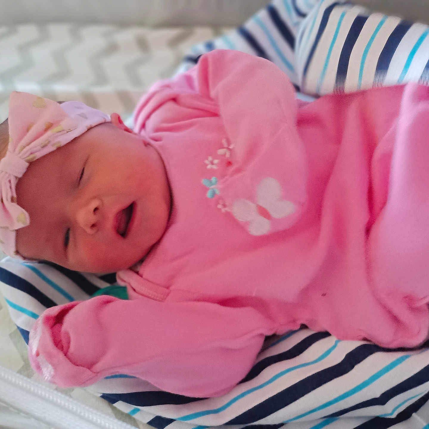 Adalee joined the competition — help win amazing prizes! baby, bed, blanket, bonnet, clothing, cradle, crib, cushion, face, furniture, hat, head, homedecor, infantbed, newborn, person, photography, portrait, quilt, sleeping