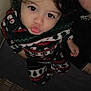 Ayden a rejoint le concours — aidez-le/la à gagner de superbes lots ! adult, big_eyes, child, christmas, closeup, clothing, cozy, cute, dark_hair, expression, face, family, holiday, indoor, looking_up, pajamas, person, portrait, smile, toddler