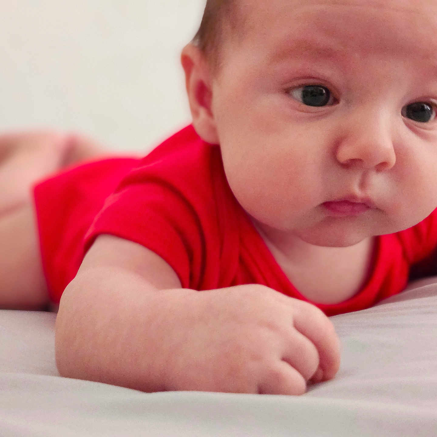 Malachi joined the competition — help win amazing prizes! arm, baby, bodypart, clothing, crawling, face, finger, frown, hand, happy, head, newborn, person, photography, portrait, sad, smile, t_shirt, wrist