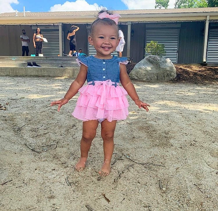 Sheshia joined the competition — help win amazing prizes! baby_toddler_clothing, barefoot, child, cloud, event, fun, grass, happy, human_leg, joy, landscape, leisure, magenta, person, pink, recreation, sand, sky, smile, soil