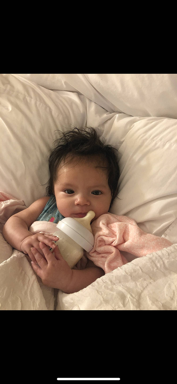 Levi is registered to the contest to win money with this photo: baby, bedding, cheek, child, comfort, eye, eyebrow, finger, flash_photography, gesture, hair, hand, happy, linens, lip, nose, person, skin, smile, thumb