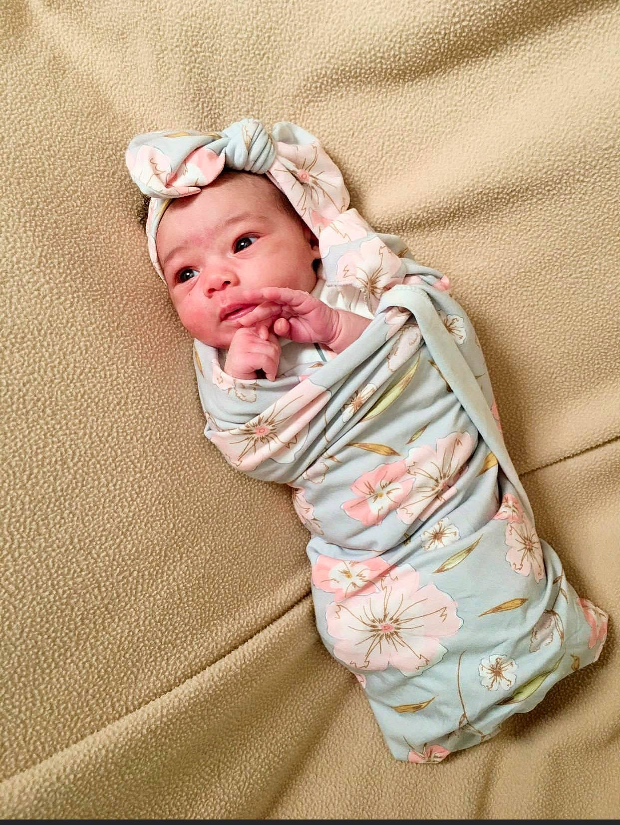 Hassen joined the competition — help win amazing prizes! baby, baby_products, baby_sleeping, baby_toddler_clothing, bedding, bedtime, cheek, child, comfort, grass, head, headwear, linens, pattern, peach, person, sitting, sleep, sleeve, textile