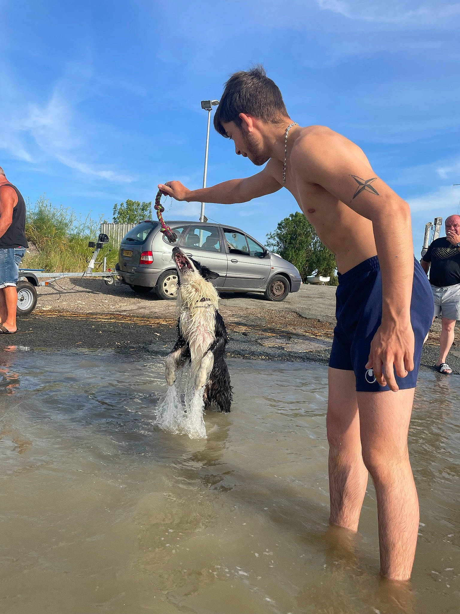 Bounty participe au concours pour gagner de l'argent avec cette photo : automotive_tire, barechested, beach, car, chest, cloud, fun, lake, leisure, ocean, recreation, shorts, sky, swimwear, thigh, tire, trunks, vehicle, water, wheel