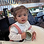 Diana participe au concours pour gagner de l'argent avec cette photo : baby, chair, child, cup, curious, curly_hair, cute, dining, expression, face, hands, high_chair, indoor, person, pink_suspender, restaurant, seat, table, toddler, white_shirt