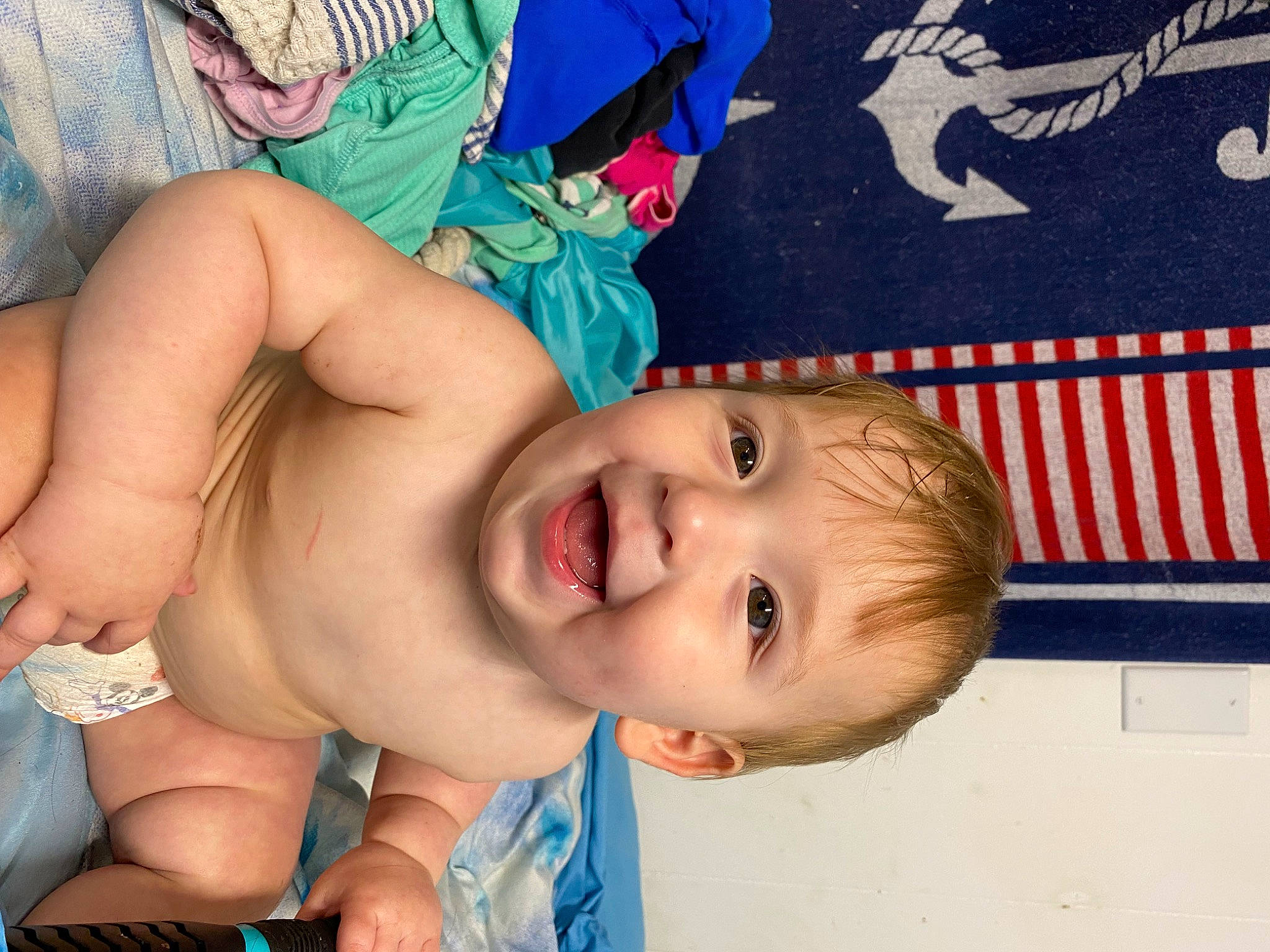 Dean Dempsey is registered to the contest to win money with this photo: abdomen, baby, baby_laughing, bathing, blue, cheek, chest, child, eyebrow, fun, happy, leisure, mouth, neck, nose, person, skin, smile, thigh, thumb