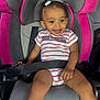 toddler, child, car_seat, smiling, happy, striped_onesie, hair_clip, seat_belt, pink, gray, sitting, baby, infant, cute, portrait, indoor, car_interior, person, clothing, safety