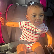 Namirah joined the competition — help win amazing prizes! toddler, child, car_seat, evenflo, striped_clothing, hair_clip, sunlight, smiling, seatbelt, pink, gray, inside_car, happy, cute, portrait, young_child, sitting, arm_rest, daylight, clothing
