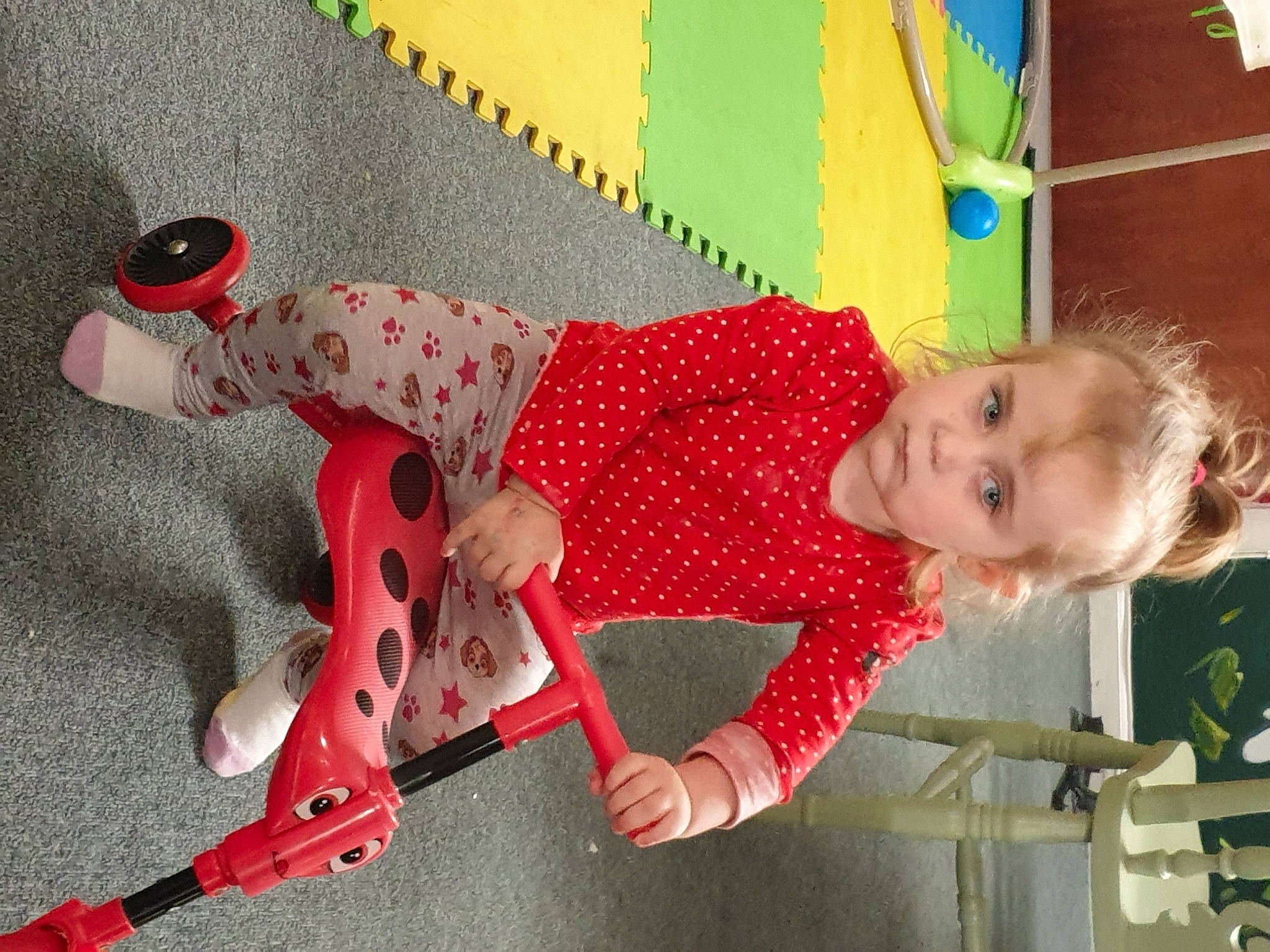 Kira-jayne is registered to the contest to win money with this photo: baby, baby_products, baby_toddler_clothing, baby_toys, carmine, child, fun, happy, pattern, person, play, red, room, sitting, smile, stuffed_toy, toddler, toy