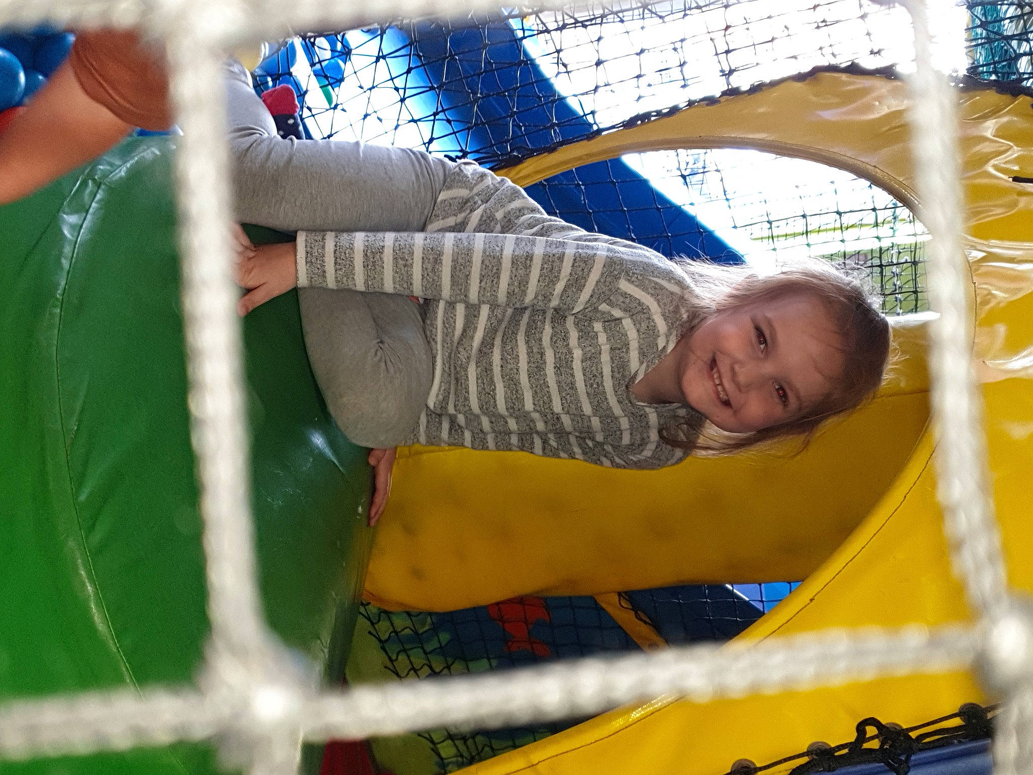 Isla-louise joined the competition — help win amazing prizes! child, comfort, electric_blue, fun, joy, leisure, mesh, net, outdoor_play_equipment, person, play, playground, recreation, shade, smile, snapshot, toddler, world, yellow