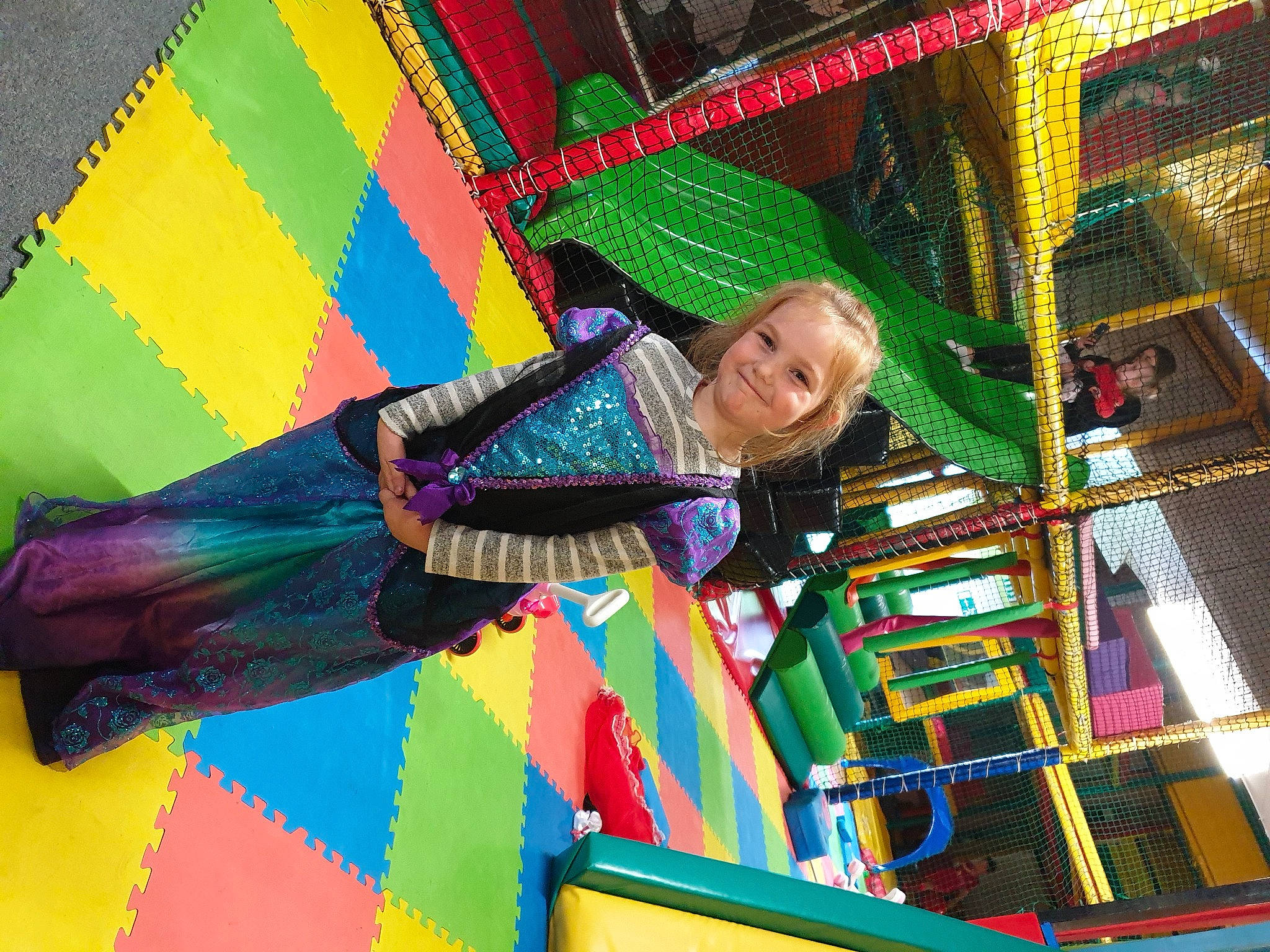 Isla-louise is registered to the contest to win money with this photo: amusement_park, amusement_ride, art, city, event, fair, festival, fun, joy, leisure, machine, magenta, nonbuilding_structure, pattern, person, play, playground, recreation, smile, tints_and_shades