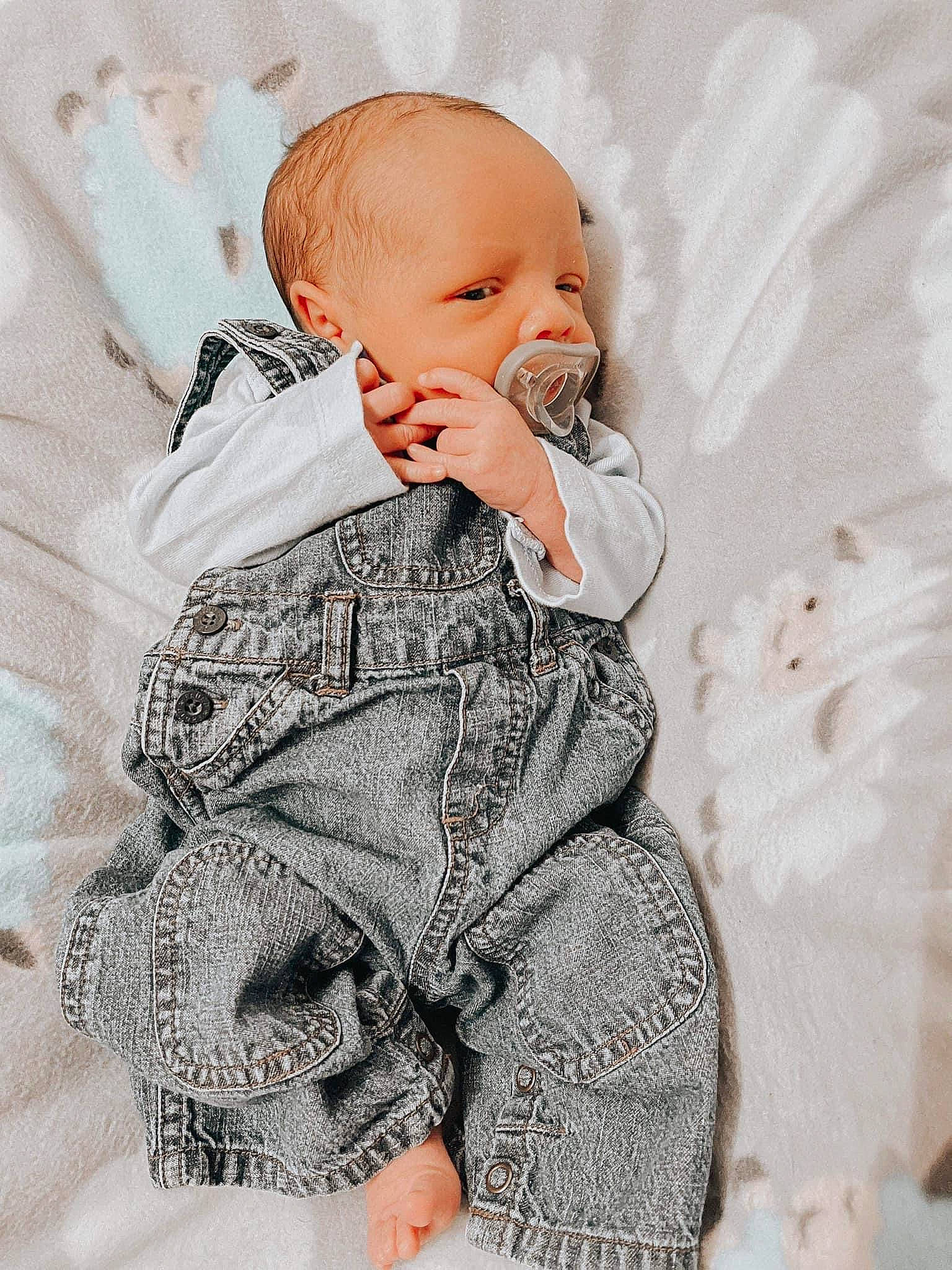 Kaleb joined the competition — help win amazing prizes! art, baby, baby_toddler_clothing, cheek, child, comfort, eye, face, head, iris, linens, lip, outerwear, pattern, person, sitting, skin, sleeve, t_shirt, textile