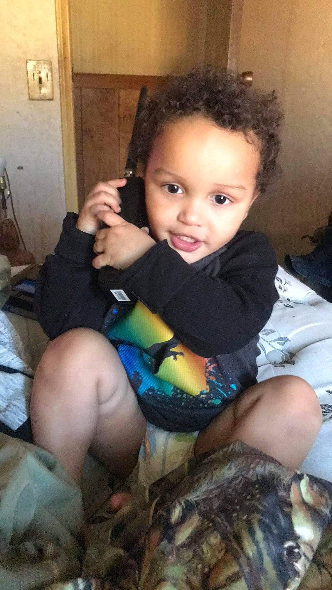 Antwan is registered to the contest to win money with this photo: baby_toddler_clothing, chair, child, comfort, door, flash_photography, fun, hair, happy, head, human_leg, iris, knee, lap, person, shoulder, sitting, skin, thigh, toddler