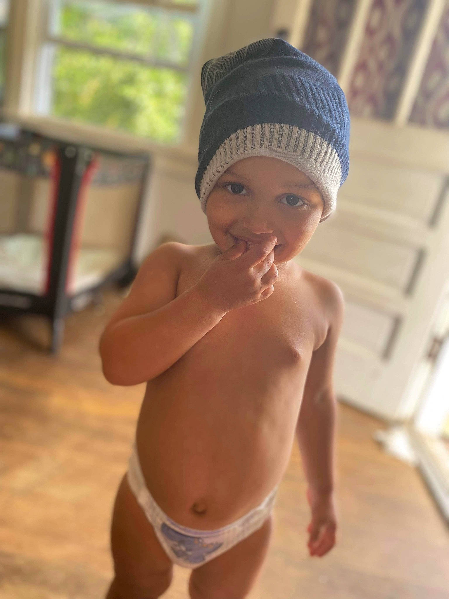 Antwan joined the competition — help win amazing prizes! barechested, cap, chest, face, finger, hand, headgear, headwear, knee, leisure, navel, neck, person, smile, swimwear, thigh, thumb, toddler, trunk, turban