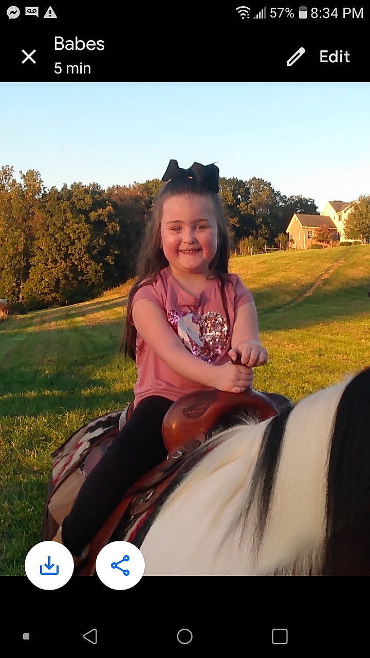 Payton is registered to the contest to win money with this photo: cool, fawn, flash_photography, grass, grassland, hair, happy, horse, horse_supplies, horse_tack, joy, landscape, nature, people_in_nature, person, photograph, plant, sky, smile, travel