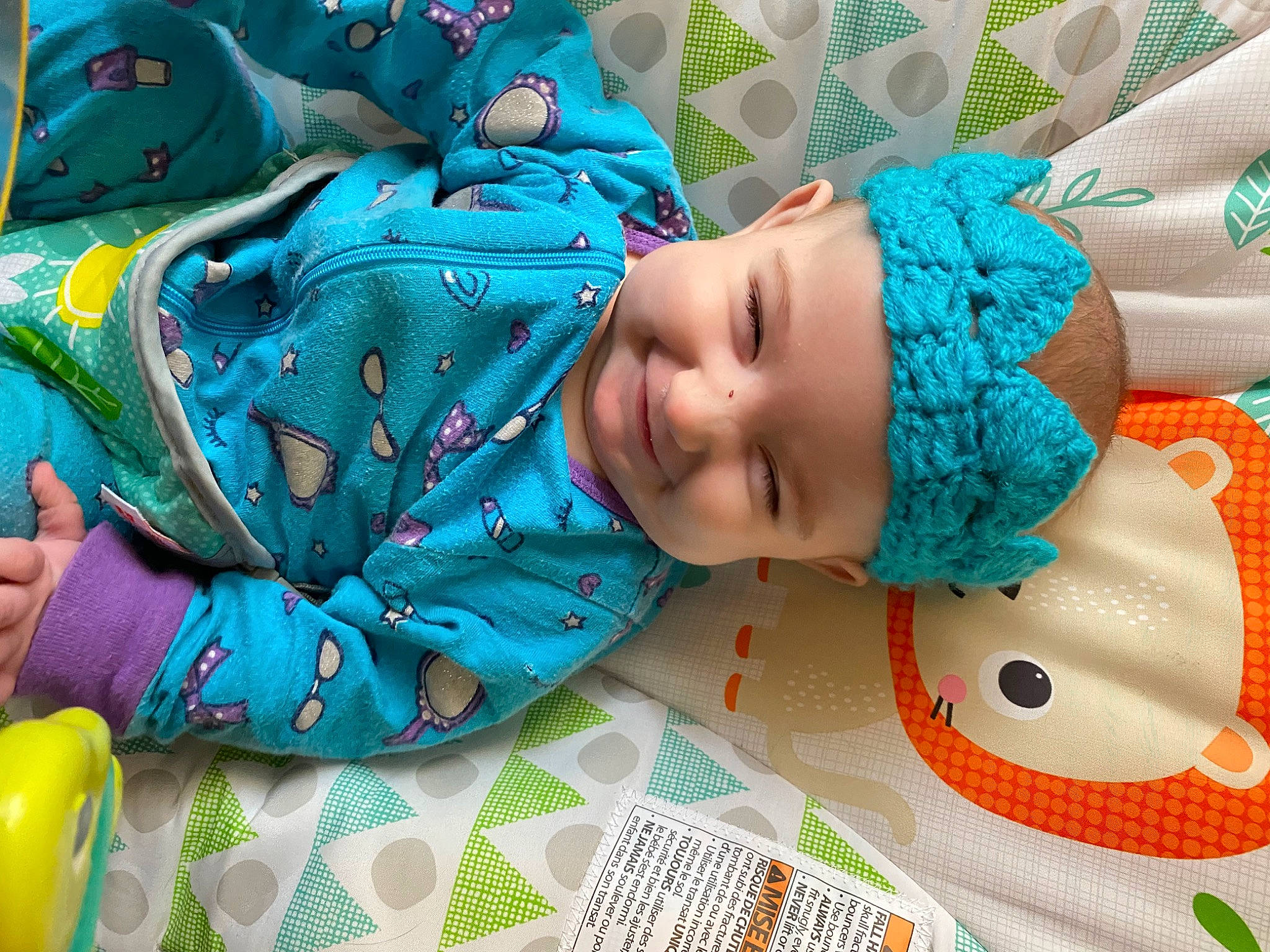 Eleanor joined the competition — help win amazing prizes! azure, baby, baby_products, baby_toddler_clothing, blue, child, comfort, electric_blue, fashion_accessory, green, happy, headwear, joy, linens, orange, pattern, person, play, room, sleeve