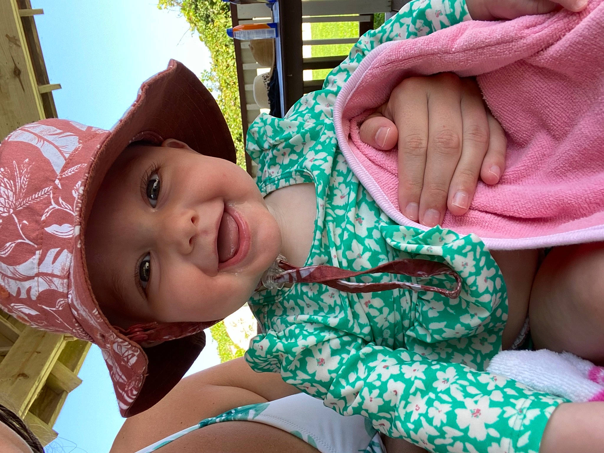 Brynley is registered to the contest to win money with this photo: child, eye, facial_expression, finger, fun, gesture, grass, green, happy, hat, headwear, joy, leisure, mouth, neck, person, pink, skin, smile, textile
