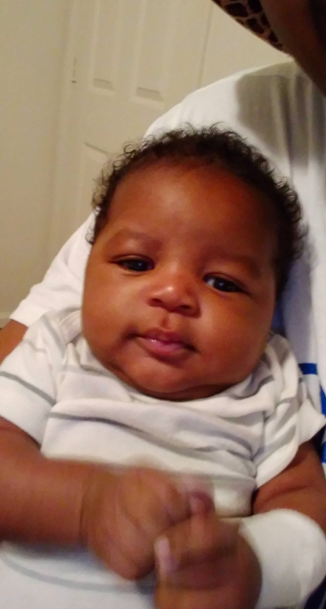 Zymier is registered to the contest to win money with this photo: baby, cheek, comfort, ear, eye, eyebrow, eyelash, finger, forehead, hairstyle, happy, iris, lip, mouth, neck, nose, person, skin, sleeve, smile