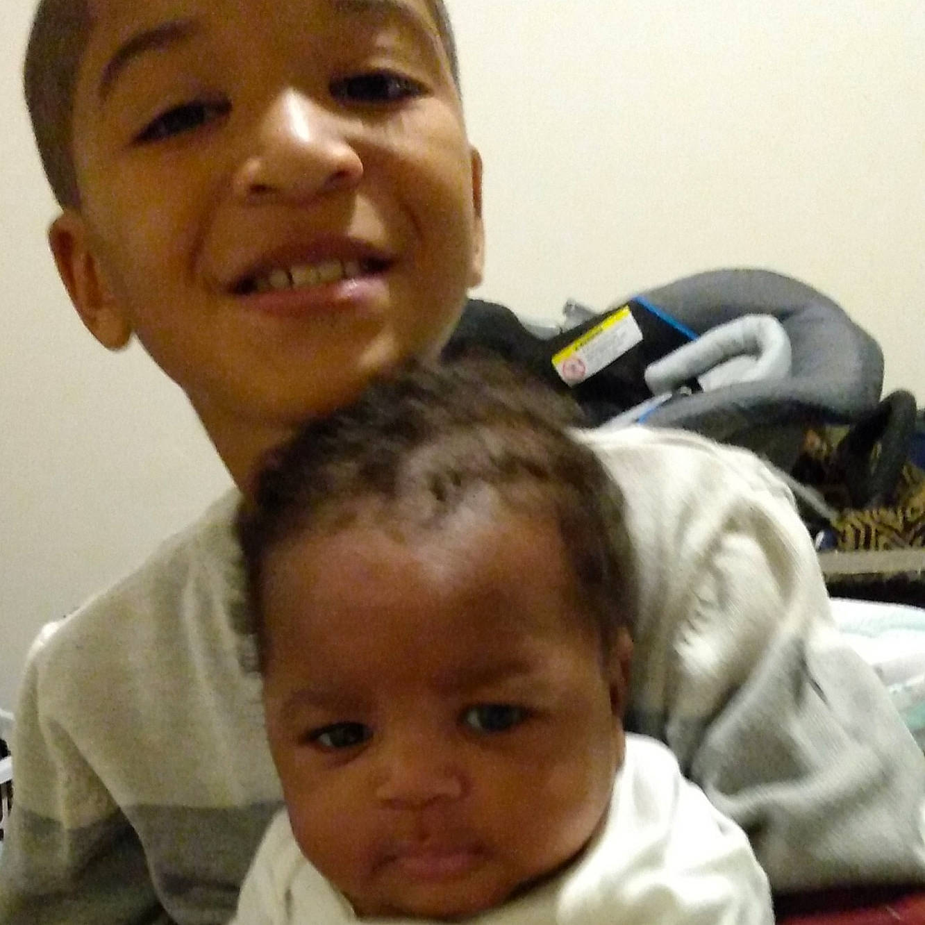 Zyaire is registered to the contest to win money with this photo: baby, cheek, child, chin, ear, eye, eyebrow, face, facial_expression, finger, forehead, gesture, happy, joy, mouth, nose, organ, person, skin, smile