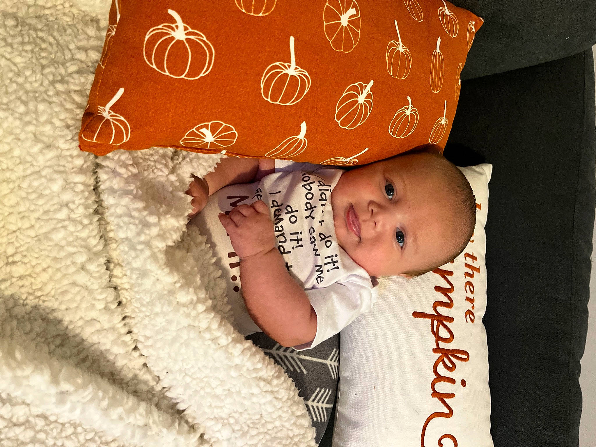 Francis is registered to the contest to win money with this photo: baby, baby_sleeping, baby_toddler_clothing, bag, bedding, child, comfort, flash_photography, font, happy, linens, luggage_and_bags, pattern, peach, person, rectangle, room, sitting, sleeve, textile