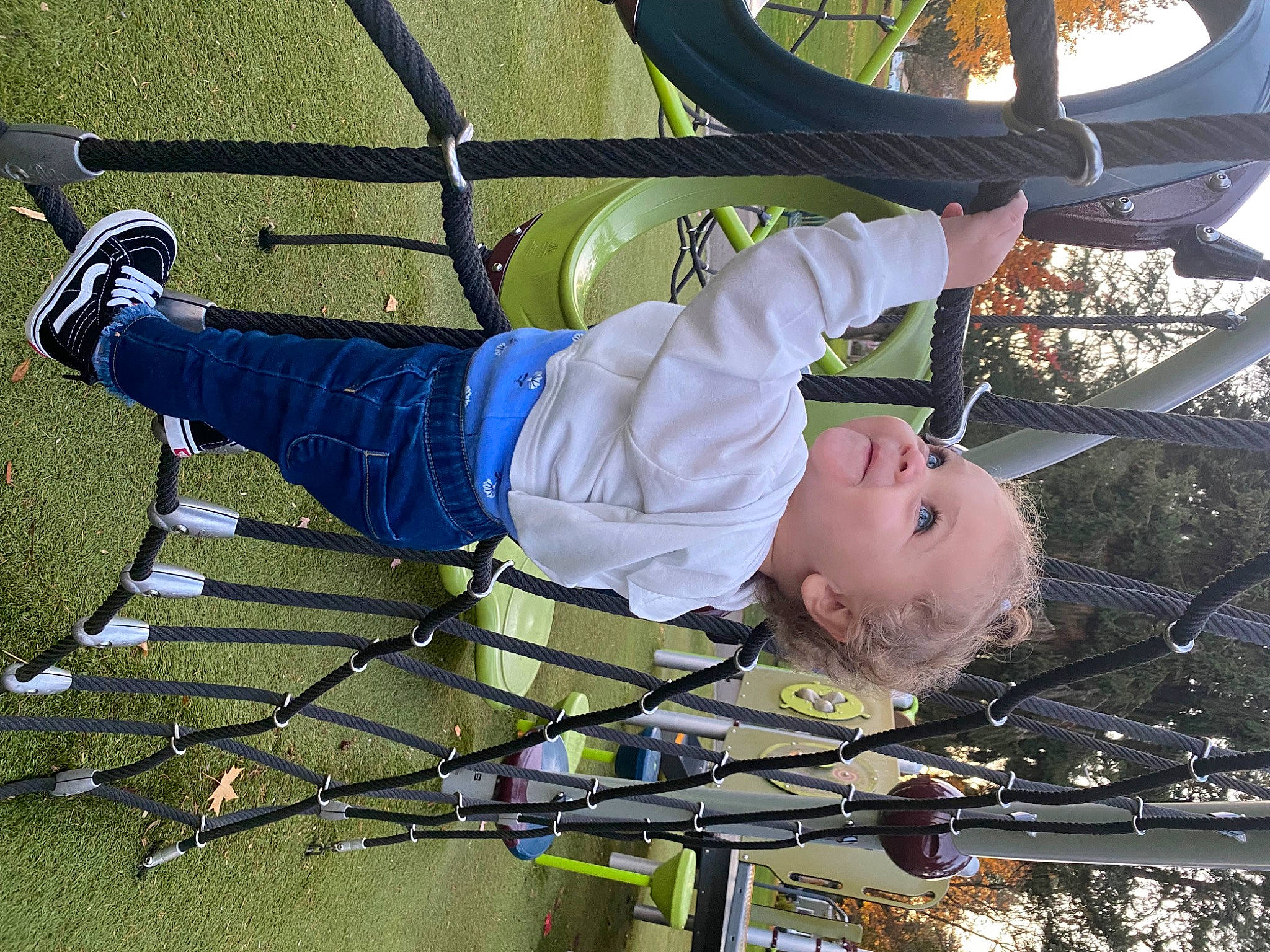 Jordyn is registered to the contest to win money with this photo: baby, child, city, fun, hat, leisure, outdoor_play_equipment, person, plant, playground, recreation, swing, toddler, tree