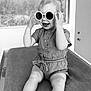 toddler, child, sunglasses, smile, indoor, happy, baby, clothing, shorts, topknot, hands, legs, cushion, monochrome, portrait, cute, joyful, fashion, playful, sitting